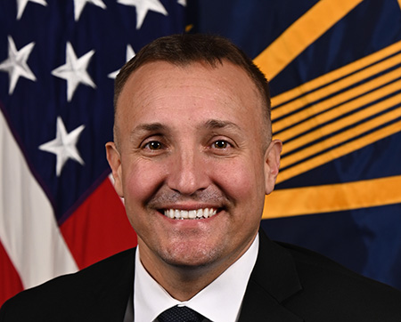 Portrait of Mr. Stuart Scheller, Senior Advisor for Personnel and Readiness.  Link to full bio below.