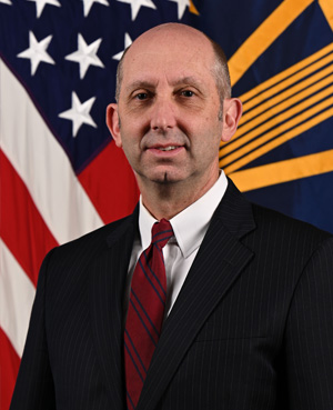 Portrait of Dr. Steve Ferrara, Acting Assistant Secretary of War for Health Affairs.  Link to full bio below.